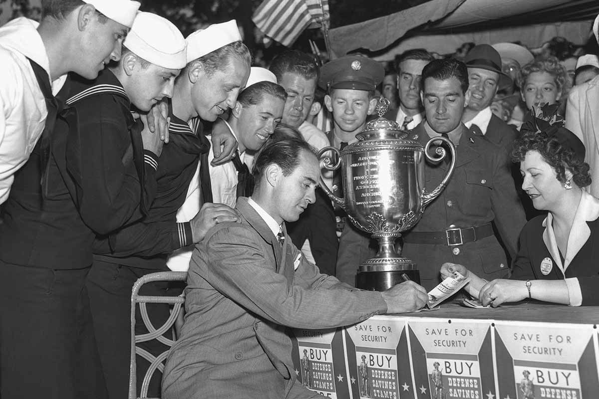 In wartime, the PGA of America purchases two ambulances for the Red Cross and distributes clubs and balls at military bases.  The Association also raises more than $25,000 for USO, Red Cross, Navy and Army Relief.